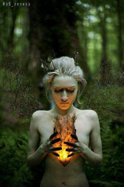 Holding this burning pyre of a heart...My fingers have known the singe..The in...